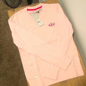 Adidas women’s crew neck golf sweater. Brand new.